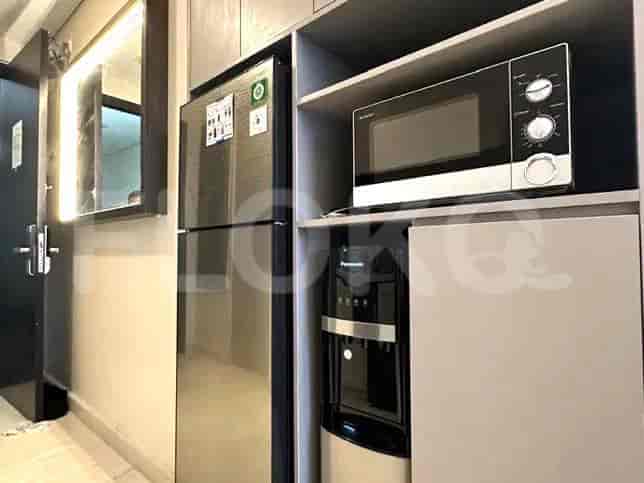 A kitchen with appliances.