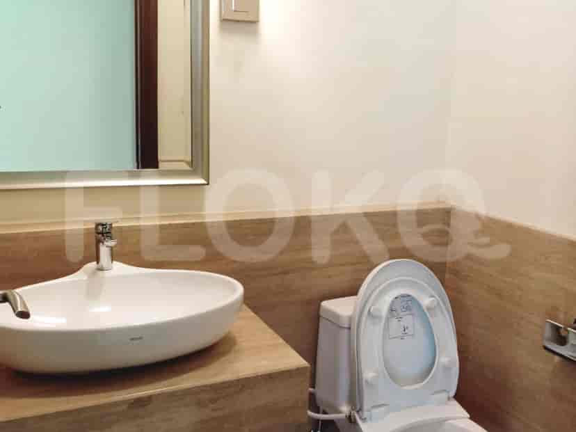 Bathroom with sink and toilet.