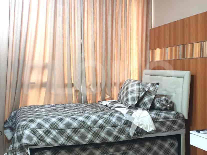 Bedroom with a bed and neutral tones.