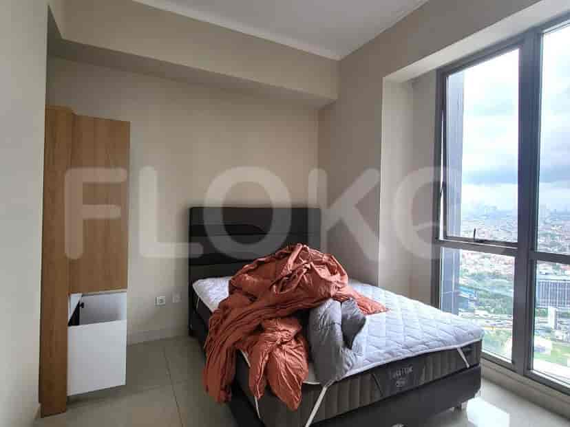Another bedroom with a bed.