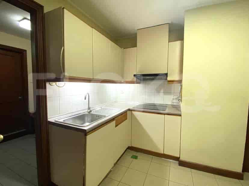 A functional kitchen with cabinets and appliances.
