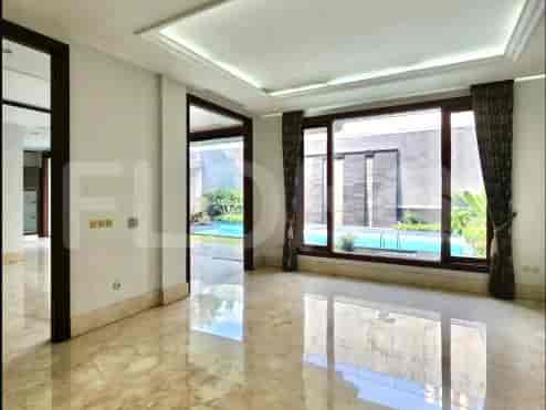 A view into the house, showing an indoor swimming pool view from inside the house.