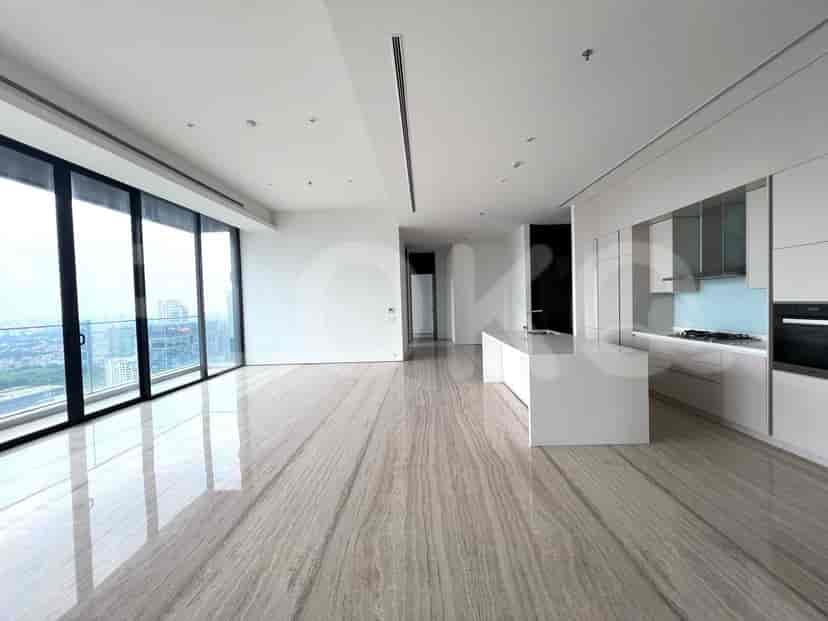 Open-plan living and kitchen area with a minimalist design.