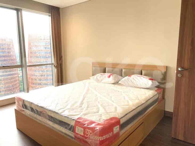 Bedroom with a bed and wardrobe.