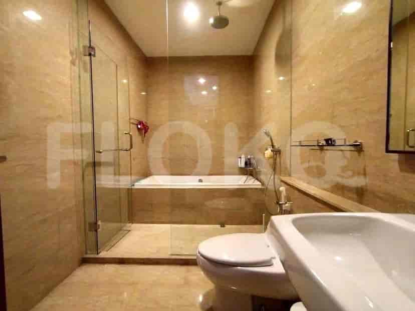 A luxurious bathroom with a bathtub, shower, and modern design.