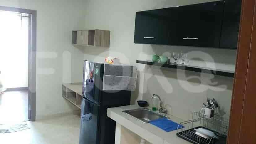 A well-equipped kitchen with cabinets and appliances.
