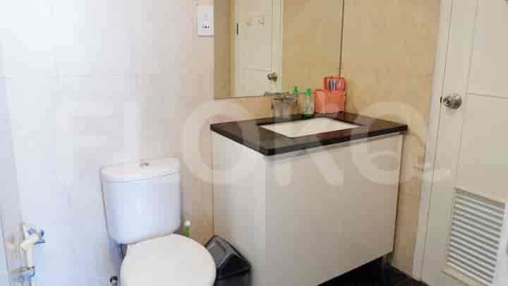 Bathroom with a toilet and sink.