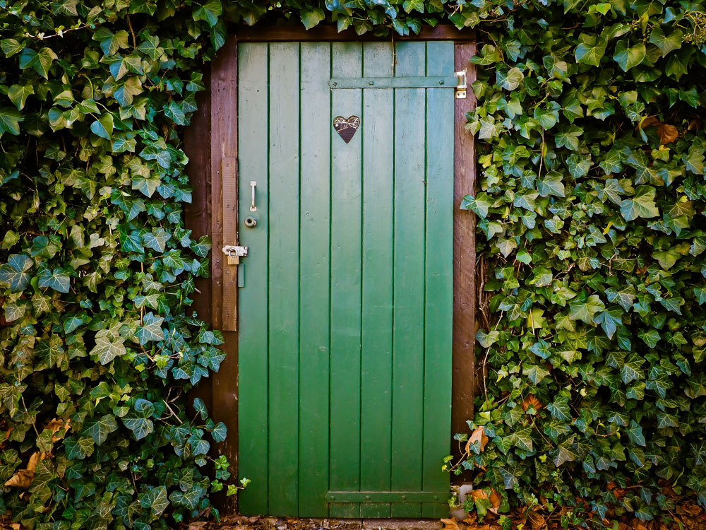green door with heart sharing apartment