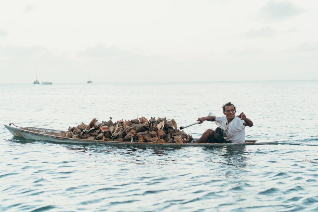 man riding boats