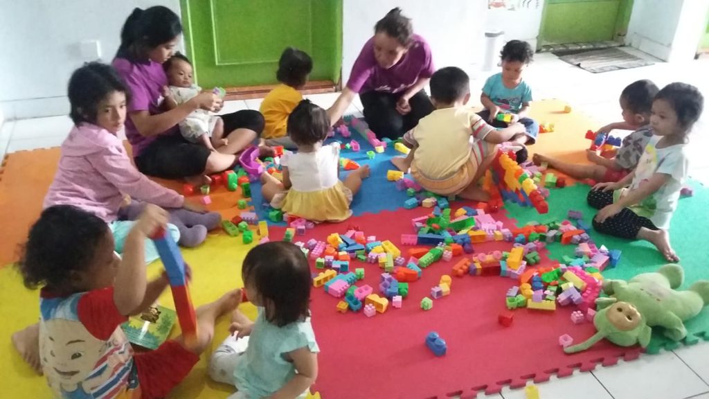 children playing at green kids daycare
