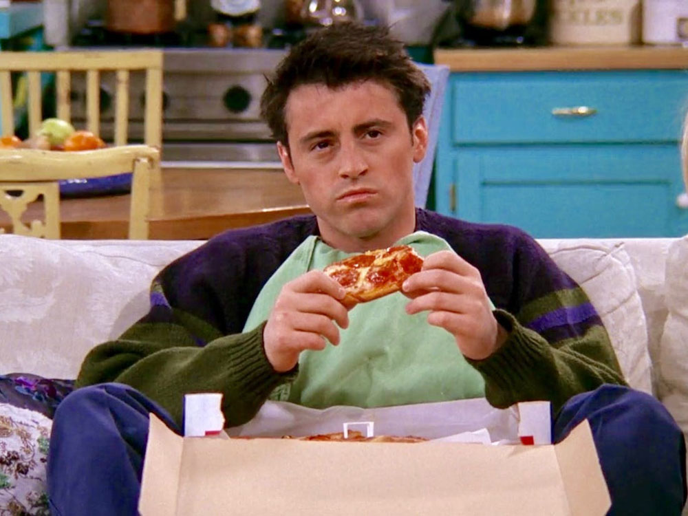 joey eating pizza coliving lessons from friends