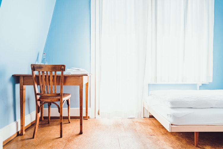 bedroom with single bed and workspace