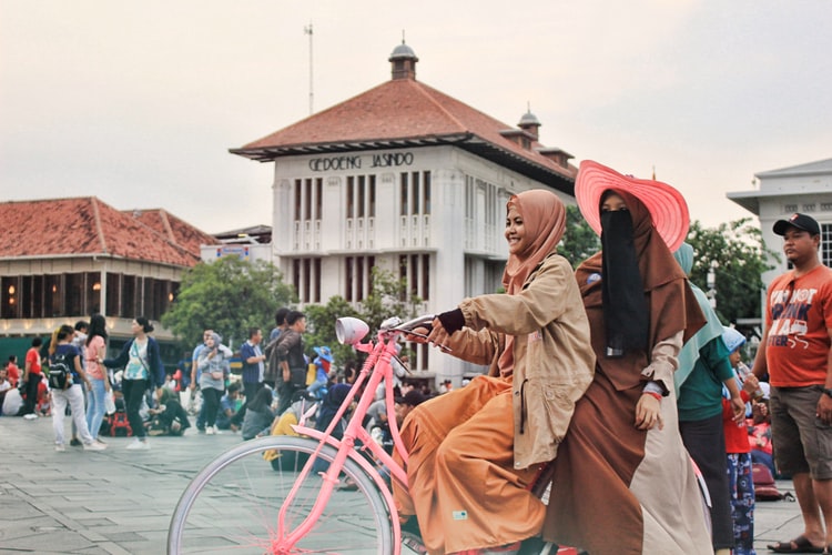 two women in a bike