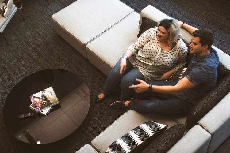 two people talk while apartment touring