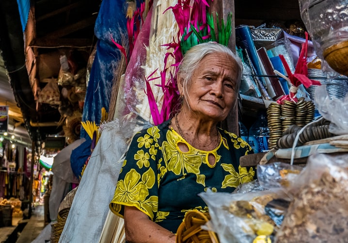 elders besides the street of bali 