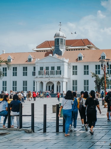 people walking around kota tua