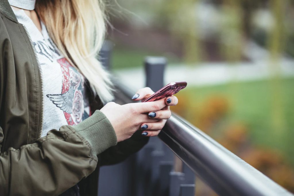 girl holding a phone