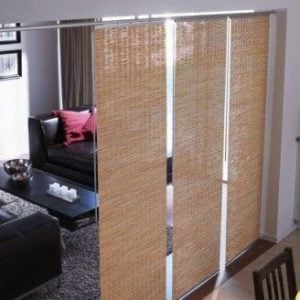 bamboo curtains are used as a living room divider