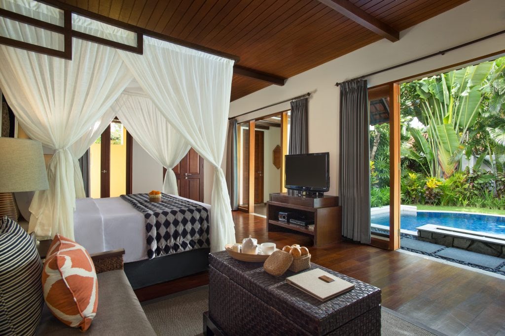 bedroom with pool-view in Alaya Dedaun Kuta Villas