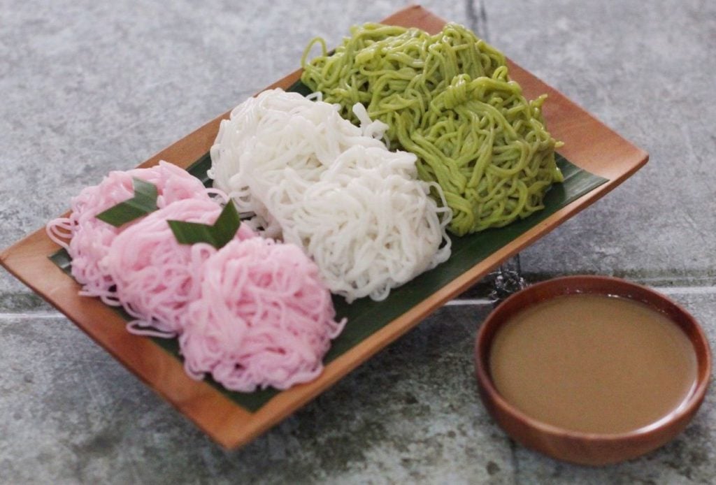 Putu Mayang cake served with mixture of coconut milk and kinca sauce