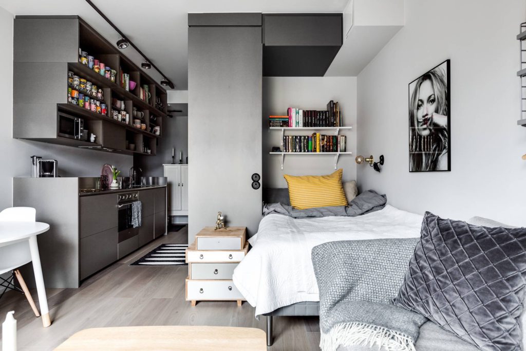 an overview of a minimalist apartment room. Small place still looks big and neat